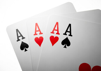 Four aces playing cards isolated on white background