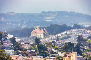 Scenic view from Twin Peaks in San Francisco, California. Colorful houses and historic architecture...