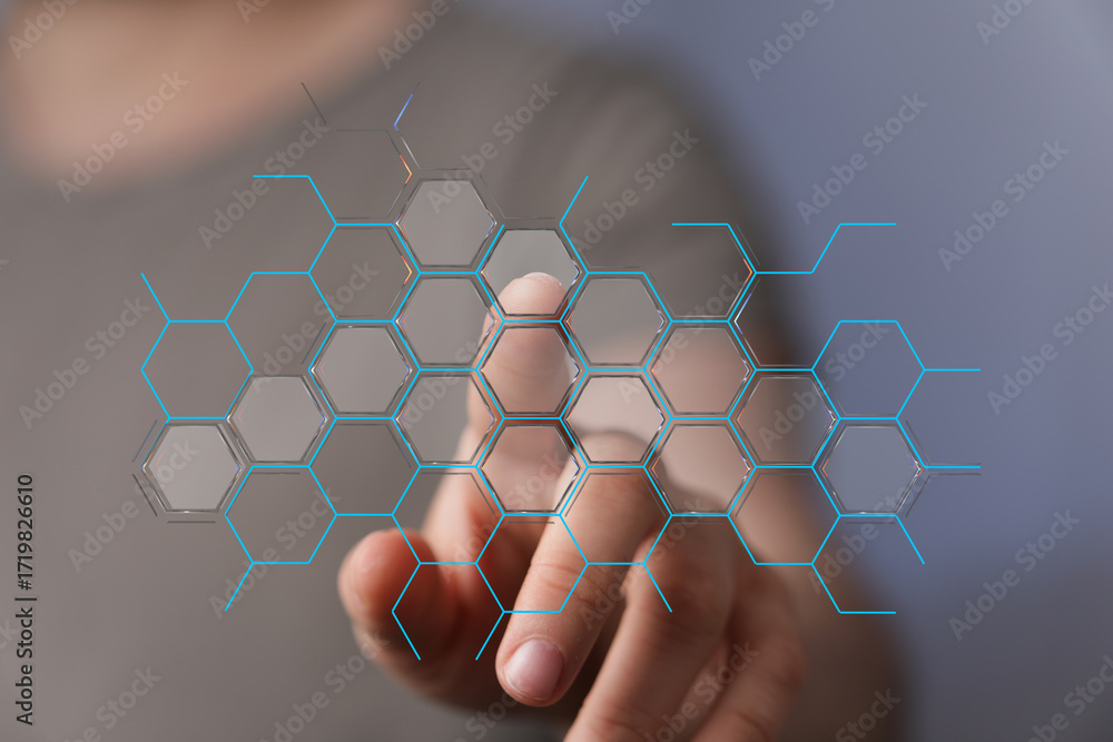 Poster abstract image of finger interacting with a digital hexagon network. technology, connection, innovat
