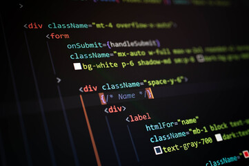 Close-up of form code with JSX structure, label element, htmlFor attribute, representing frontend UI design, input layout, and clean web app development practices.