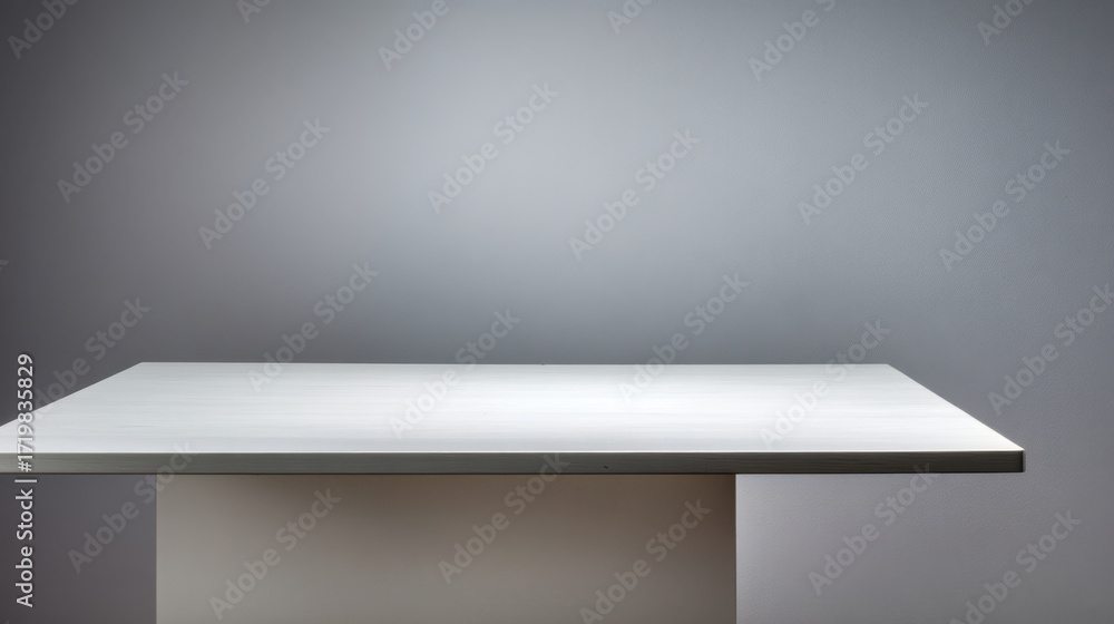 Aufkleber minimalist white table with smooth surface is set against soft gray background, creating serene and 
