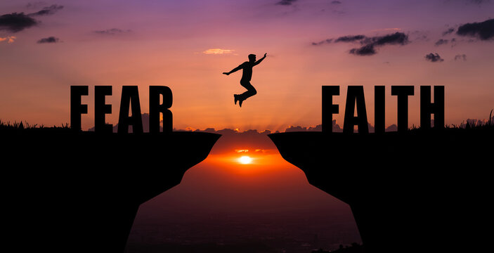 Silhouette of a person jumping from fear to faith over a gap between cliffs at sunset, symbolizing courage, trust, personal growth, resilience, overcoming doubts, inner strength, and belief in oneself