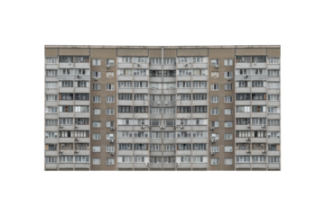 Old prefabricated nine-storey apartment building with balconies is isolated.