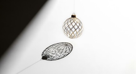 Decorative Glass Lantern Hanging in Minimalist Interior with Shadow Play