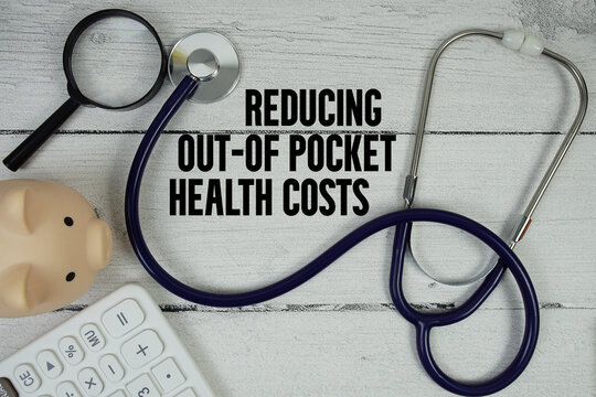 Reducing Out-of-Pocket Health Costs text with Stethoscope and magnifying glass on wooden background