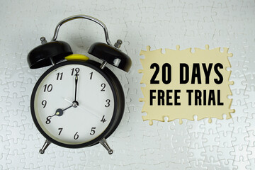 20 Days Free Trial text with alarm clock on yellow background