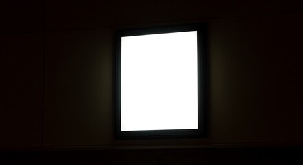Mockup a blank illuminated frame hangs on a dark wall, ready for content for commercial usage