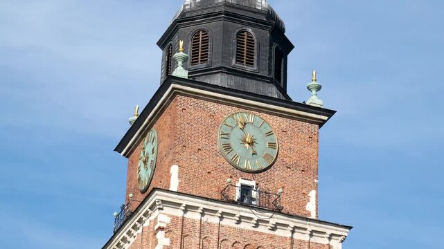 Poland Krakow Cloth Hall Sukiennice Market and St. Mary's Basilica Bazylika Mariacka in the City Centre of Krakow, Poland, a Polish cultural capital with renaissance architecture
