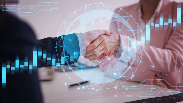 Business handshake deal between two businesspeople global network technology finance success collaboration in modern office