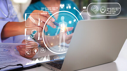 Adult Asian Medical Professionals Utilizing Advanced Healthcare Technology Digital Medicine Laptop Displaying Holographic Interface Patient Data Analysis AI Innovation