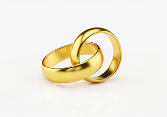 Two intertwined gold wedding rings isolated on white background