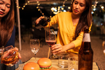 young woman with a glass of wine