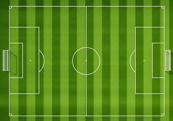 Top view of a green soccer field with white lines and goals