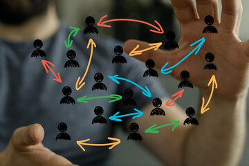 Close-up of a man's hands reaching towards the camera, conveying interaction or connection.