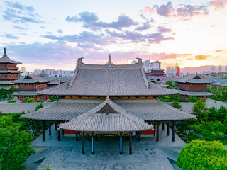 Fototapeta premium Aerial photography of Huayan Temple in Datong, Shanxi, China on a sunny summer day with fiery clouds