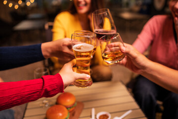 man and woman drinking wine in bar