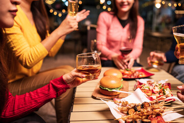 young couple celebrating with champagne at christmas