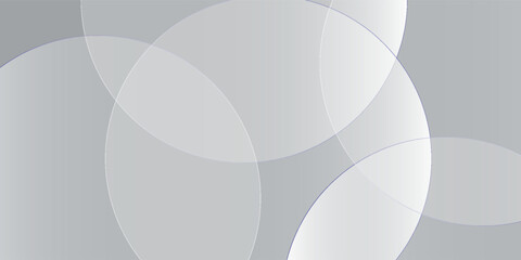 Gray abstract background with overlapping circles. The background is smooth and modern, featuring shades of gray and a sleek texture. Minimal abstract circles vector gradient background