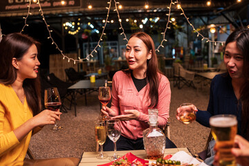 group of young people in restaurant