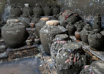 Aged sorghum wine stored in the basement cellar