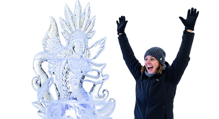 Excited woman with arms raised in celebration next to a large, ornate ice sculpture of a mythical creature, isolated transparent