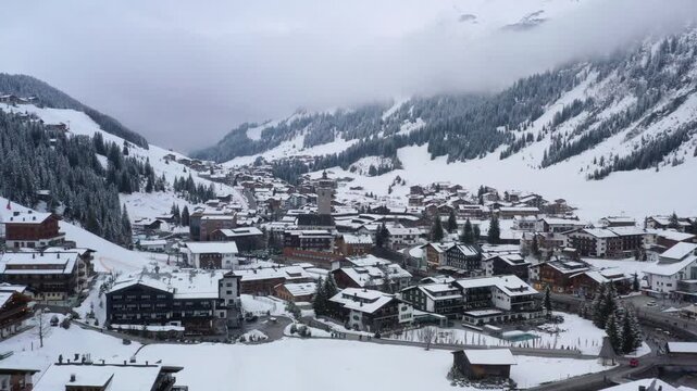 A drone captures the picturesque village of Lech in Austria in winter.