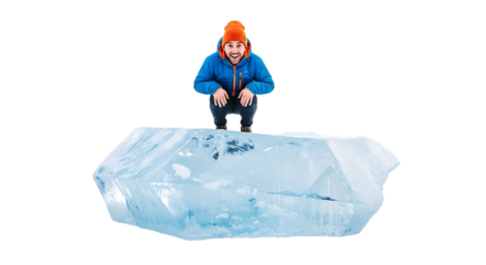 Man crouching a large block of ice, looking surprised, isolated transparent
