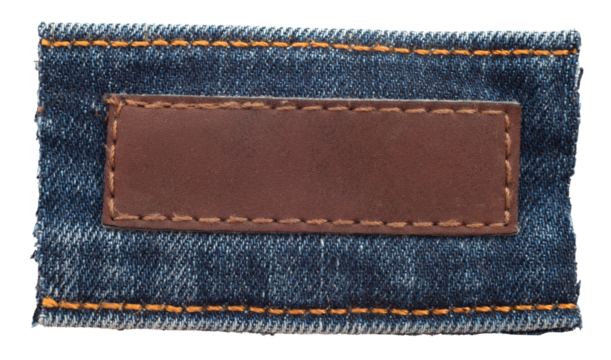 Empty worn leather patch on a white background. Empty space for writing. Blank leather jeans label