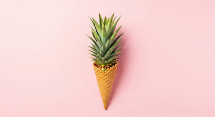 Whimsical Pineapple Top in Waffle Cone Against Pastel Pink Backdrop A Playful Still Life Composition with Tropical Fruit and Sweet Treat Elements for Summer Vibes