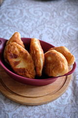 fried homemade pies with potatoes