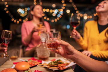 Celebrate whisky at an intimate party at a camping restaurant. A group celebration.	