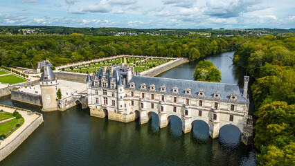 Aerial view of Ch&acirc;teau de Chenonceau, one of the most famous Loire Valley castles in France. Renaissance architecture spanning the River Cher, surrounded by lush forests and beautifully landscape