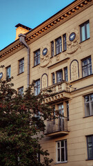 Elegant Beige Building with Balcony and Ornate Architectural Details of Minsk city
