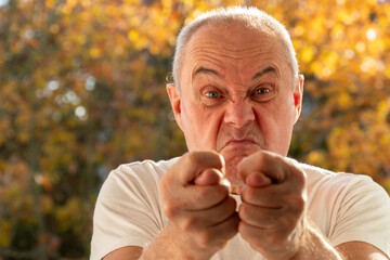 gesture fig, Angry Aggressive Stressed senior man, visual person experiencing intense frustration,...