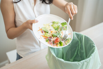 Food waste environment concept, people throwing food garbage into bin prepare to decompose.