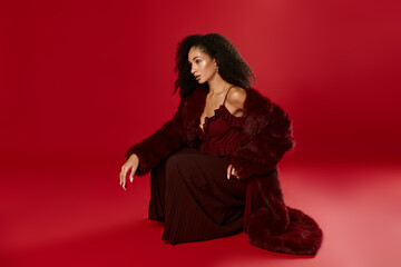 Stylish autumn fashion showcase featuring a beautiful African American woman in a studio