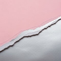 Minimalist pink paper torn to reveal a silver background with a clean aesthetic