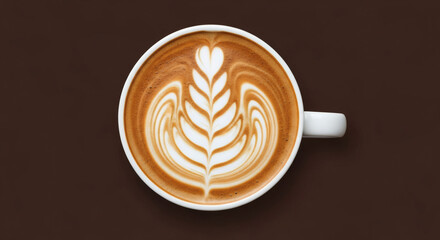 Latte art in a white cup on a brown background, top view.