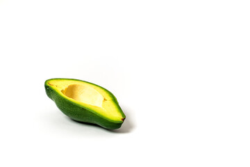 Isolated half avocado on a white background, emphasizing freshness and healthy eating, perfect for...