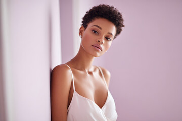 confident woman gazes into mirror against soft lilac background embodying selfreflection and trust