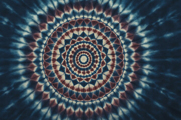 Fototapeta premium Vibrant watercolor tie dye mandala pattern with psychedelic ringed design