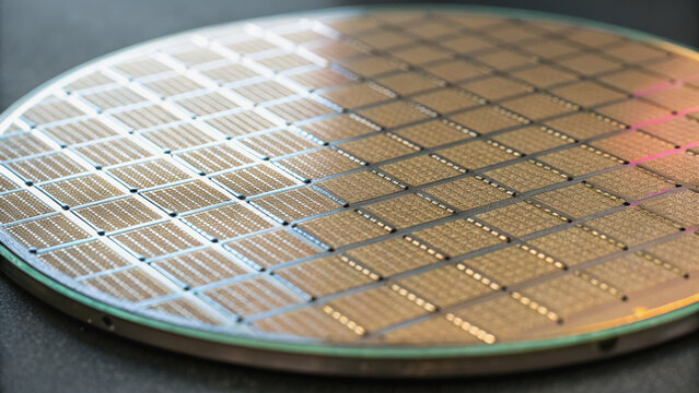 Polished silicon wafer grid pattern microchip array gold tone cleanroom macro technology precision science innovation futuristic calm