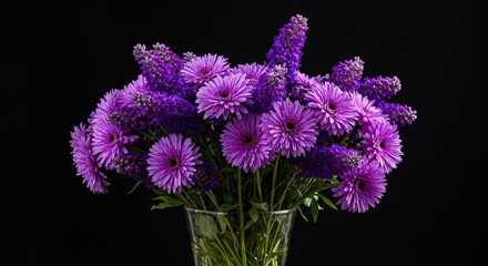 Purple flowers in a vase against a black background view