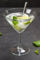 Misted wine glass with lime and ice.