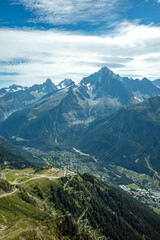 Fototapeta premium Chamonix Valley Panorama with Alpine Peaks and Forested Slopes