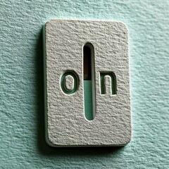 Minimalist Light Switch Design with Engraved On-Off Symbols in Soft Colors