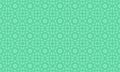 A light green background with a repeating pattern of floral and geometric shapes throughout it