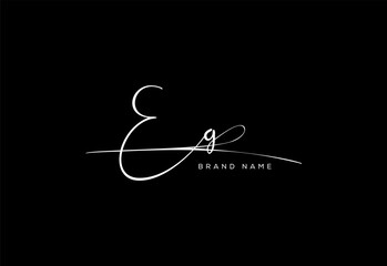 EG letter beauty cursive handwriting logo.