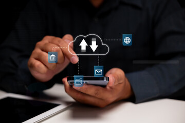 A person interacts with a smartphone, displaying a cloud symbol with icons for various online activities like email and web browsing.