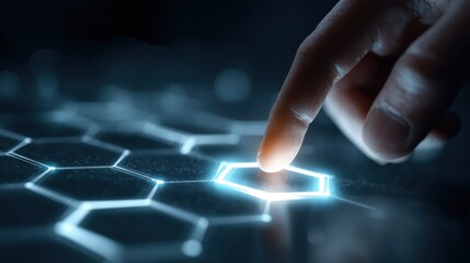 finger touching glowing hexagon grid